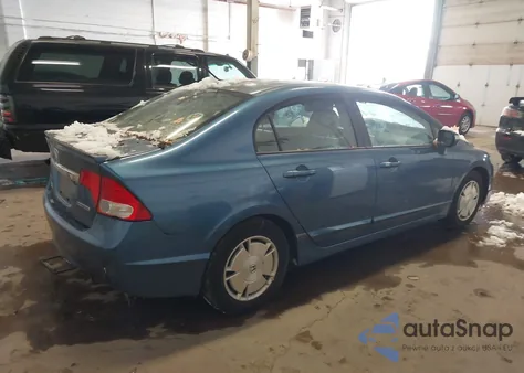 2010 Honda Civic Hybrid from USA, damaged, VIN JHMFA3F23AS004128